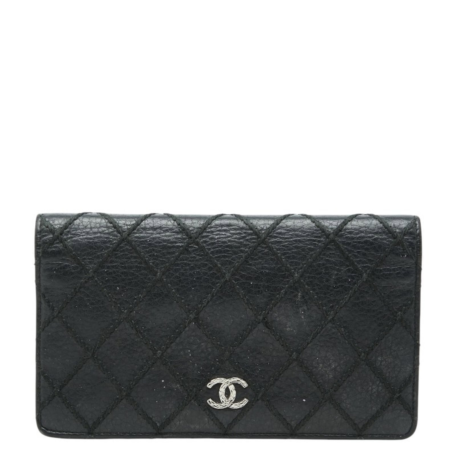 Chanel Long Wallet (Bi-Fold) Leather: Chanel Long Wallet (Bi-Fold) Leather Black leather bi-fold wallet from Chanel, measuring 11cm x 18cm x 1.5cm. This long wallet features a classic design with clean lines and a timeless aesthetic.