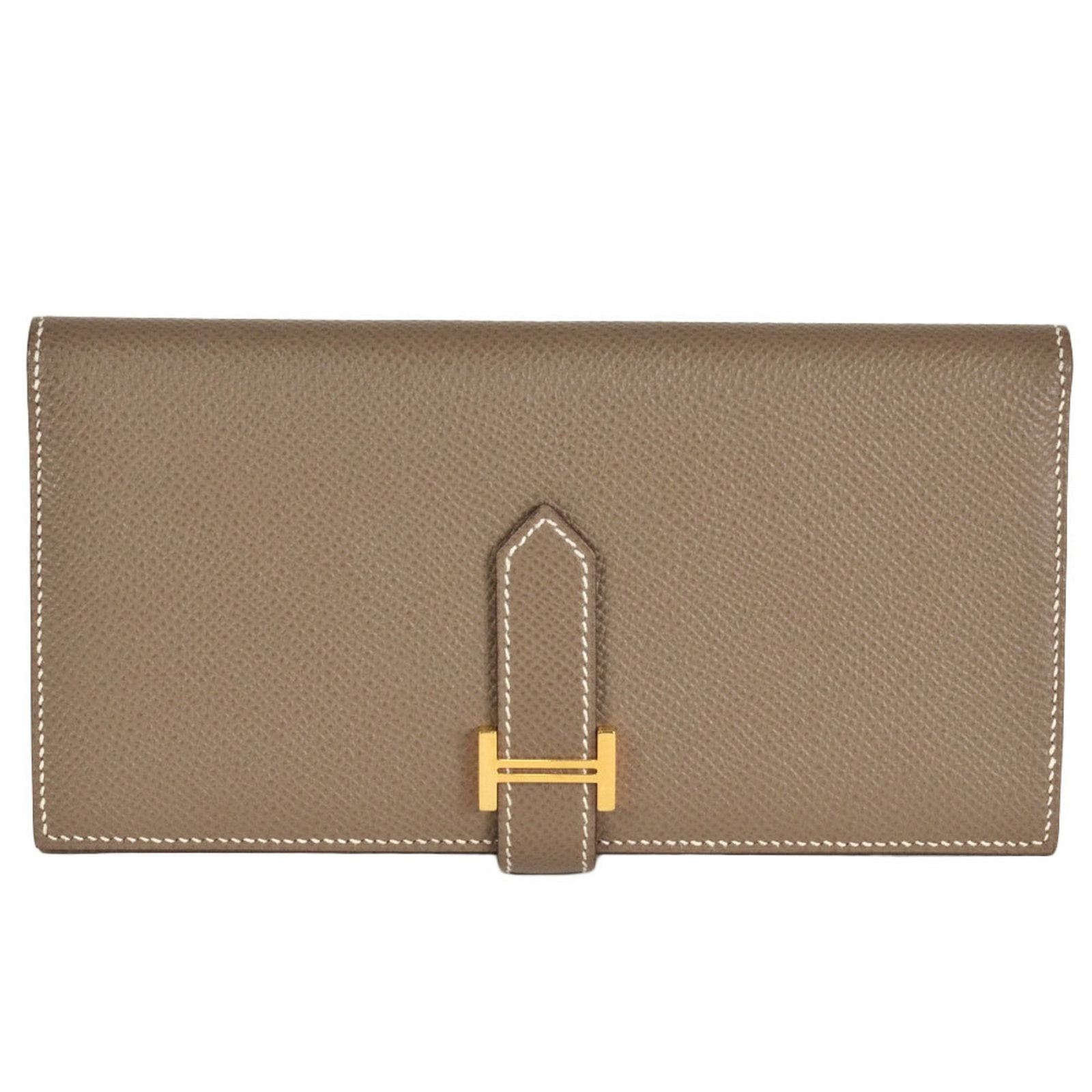 Epsom Leather Bi fold Wallet Hermes: Epsom Leather Bi fold Wallet Hermes Epsom leather bi-fold wallet from Hermes, featuring a classic design with a sophisticated etoupe gray color. Made from high-quality Epsom leather, this long wallet