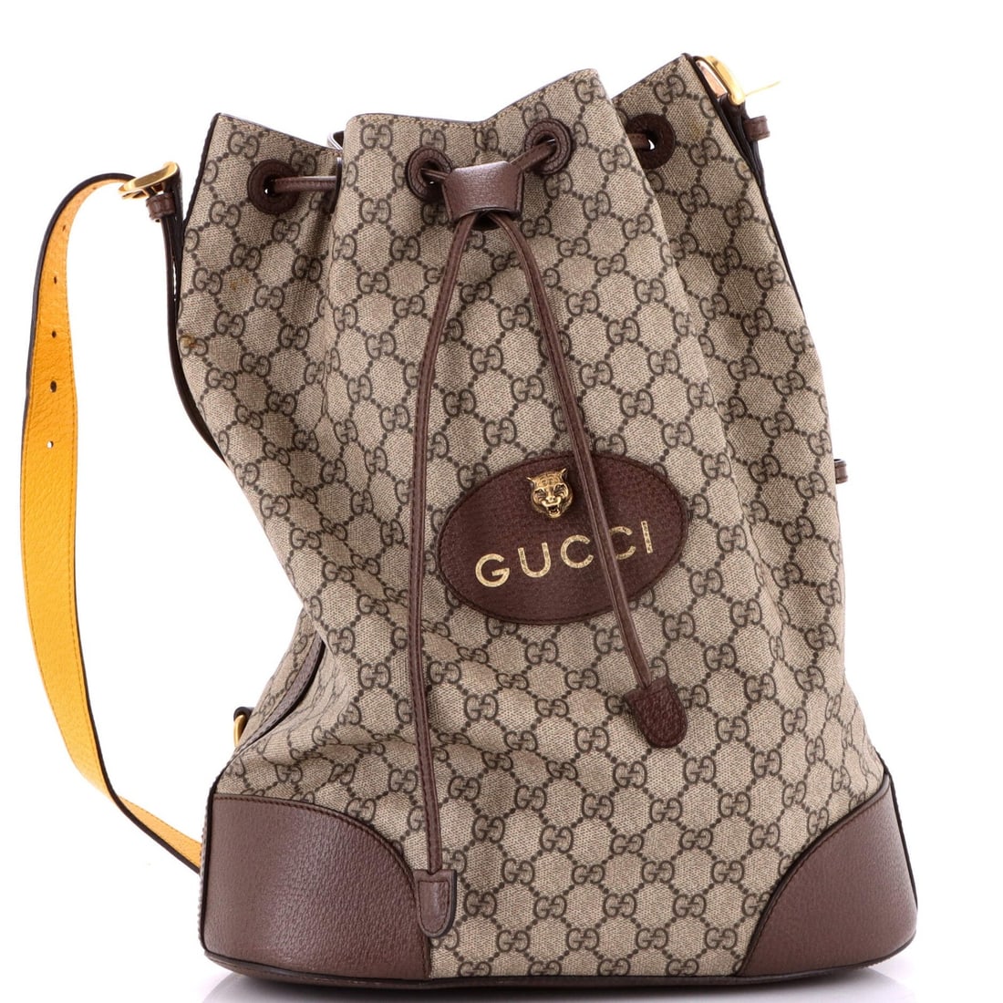 Gucci Drawstring Bucket Backpack Large Canvas GG Coated: Gucci Drawstring Bucket Backpack Large Canvas GG Coated Brown canvas coated backpack with a classic drawstring design, featuring a large capacity and extra strap for added convenience. This Gucci Neo 