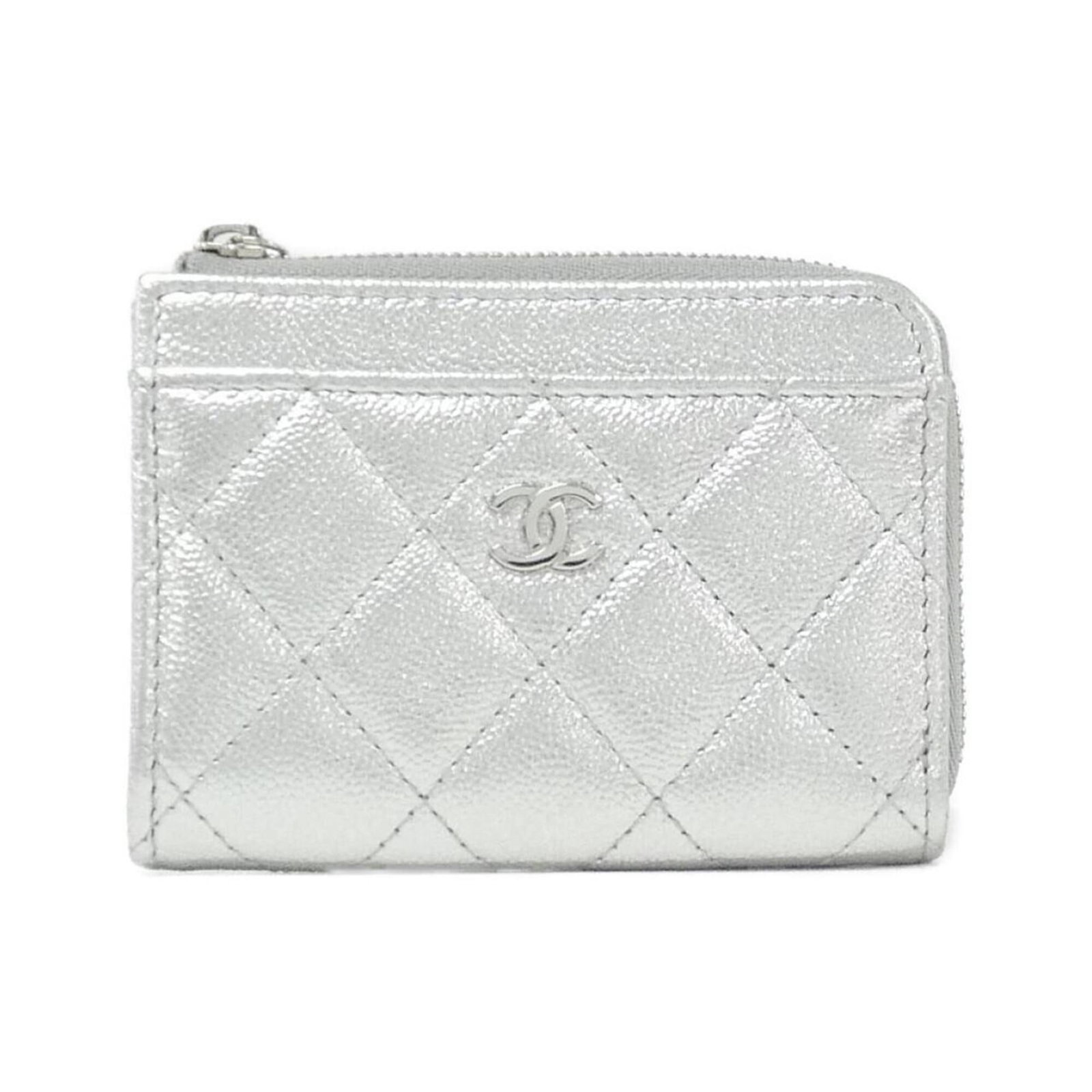 Card Case Calfskin Grained Chanel: Card Case Calfskin Grained Chanel Card Case Calfskin Grained Chanel is made from genuine grained calfskin. The silver color and classic design make it a timeless accessory. Measuring 8cm x 11cm x 2cm,