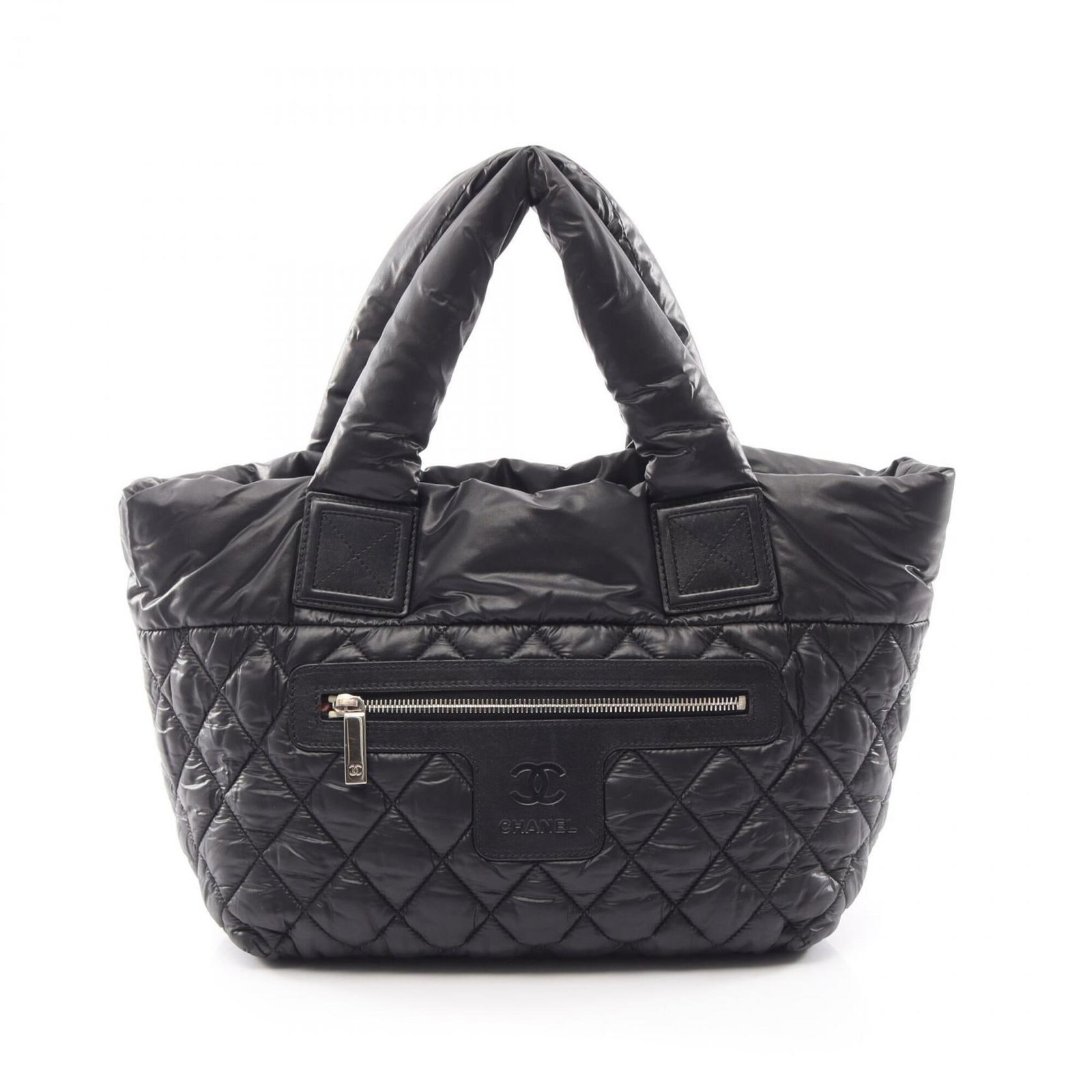 Nylon Leather Tote Chanel Bag Handbag: Nylon Leather Tote Chanel Bag Handbag Nylon and Leather Chanel Bag Handbag. Made from a combination of nylon and leather, this tote bag features a black color and measures 23cm x 28cm x 15cm. The bag'