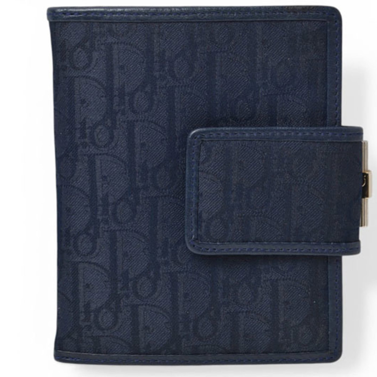 Dior Wallet Leather Canvas Bi Fold: Dior Wallet Leather Canvas Bi Fold The Dior Wallet Leather Canvas Bi Fold boasts a sleek navy color and durable leather construction. With its spacious inner pocket, six card slots, and two outer pock