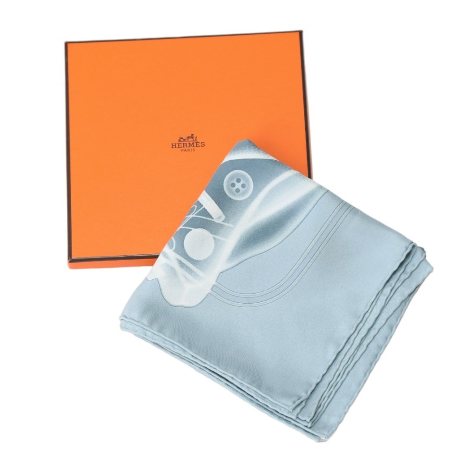 Silk Hermes Scarf: Silk Hermes Scarf Silk from the renowned French fashion house, this 70cm x 70cm blue and gray silk scarf is a timeless accessory. Made from high-quality silk, it features a classic design that complem