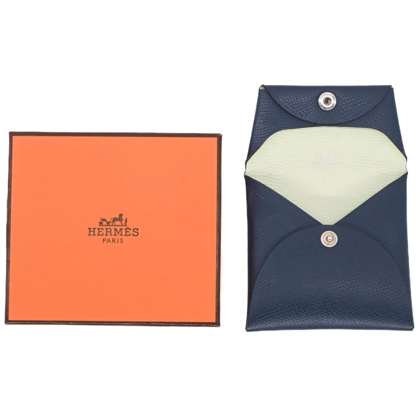 Hermes Coin Purse/ Coin Case Epsom Leather: Hermes Coin Purse/ Coin Case Epsom Leather Epsom leather craftsmanship shines in this elegant coin purse, crafted in France by the renowned brand Hermes. The light green and navy color combination