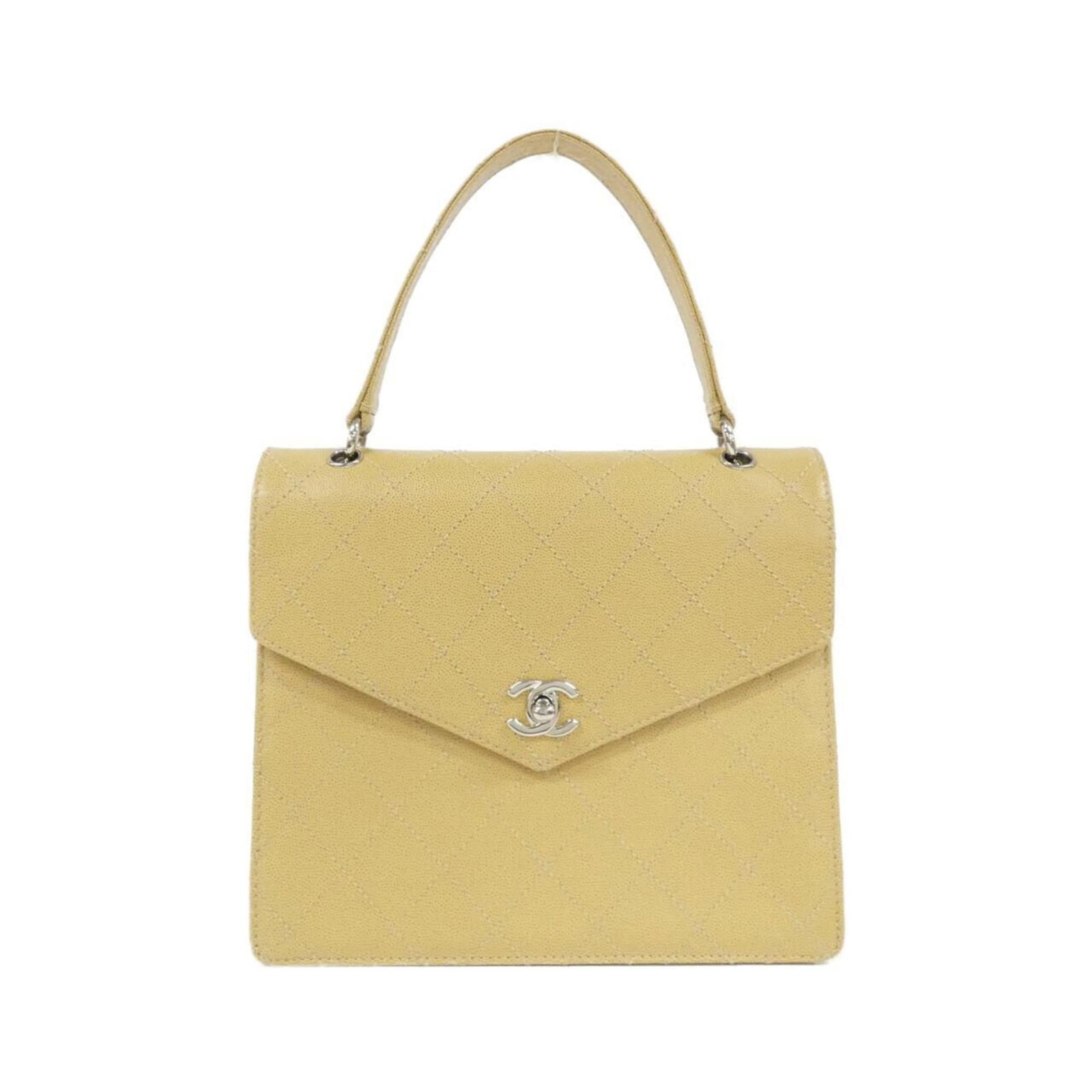 Calfskin Handbag Chanel: Calfskin Handbag Chanel Grained calfskin gives this Chanel handbag a luxurious feel, while the beige color provides a timeless and elegant base. The silver hardware adds a touch of sophistication,