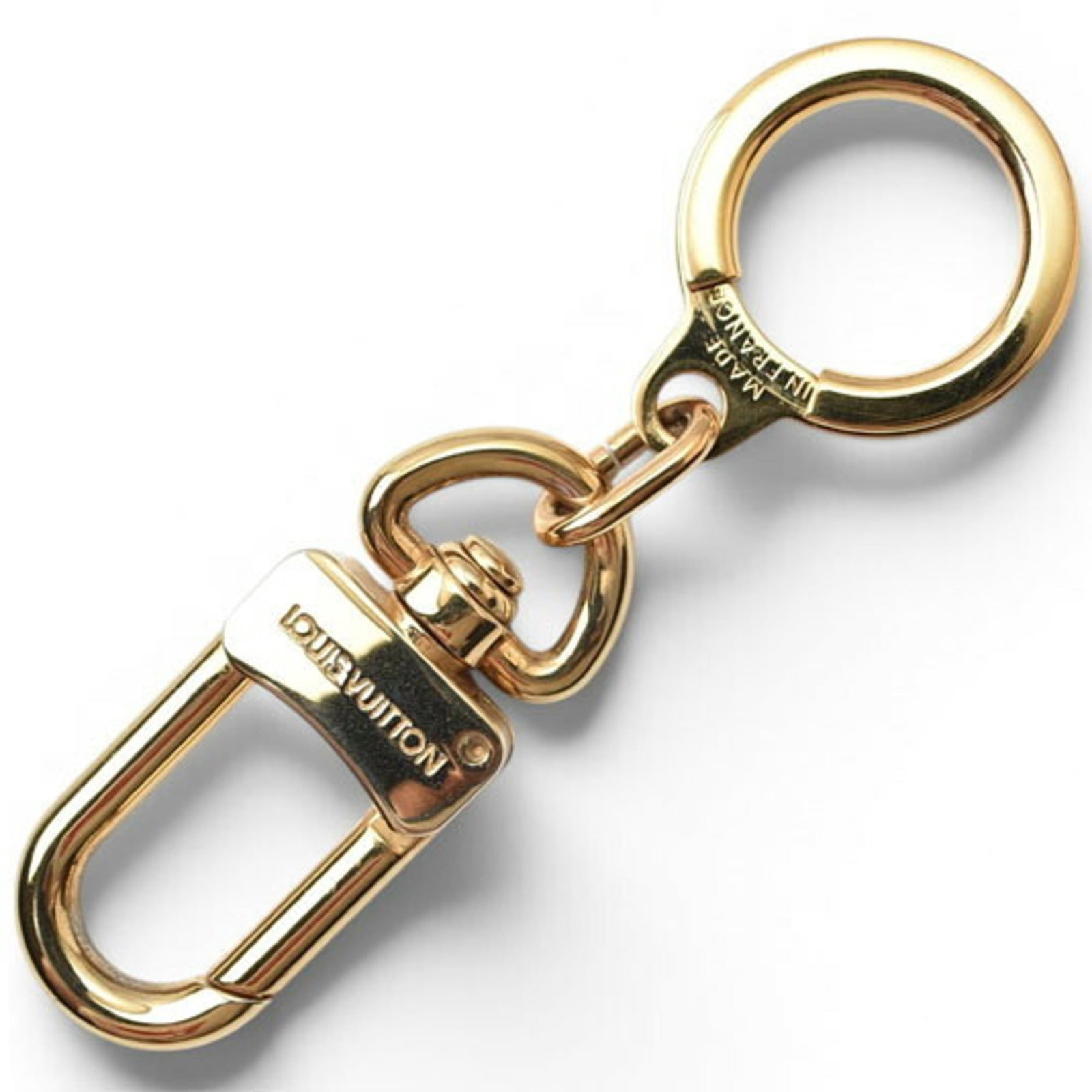 Vuitton Metal Louis Keyring: Vuitton Metal Louis Keyring The Louis Vuitton Metal Louis Keyring is a sleek gold metal keyring with a diameter of 2.2cm, featuring a classic design. Made from high-quality metal, this keyring has a r