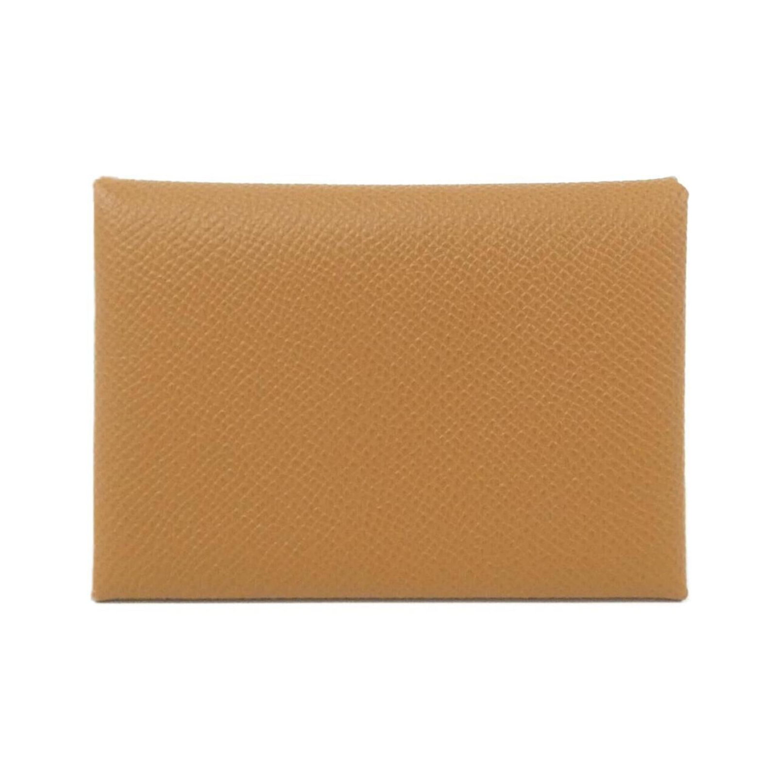 Hermes Coin Purse/ Coin Case Epsom Leather: Hermes Coin Purse/ Coin Case Epsom Leather Epsom leather craftsmanship shines in this elegant gold coin purse/coin case from Hermes, measuring 7cm x 11cm x 1.5cm. The soft, supple leather provides a