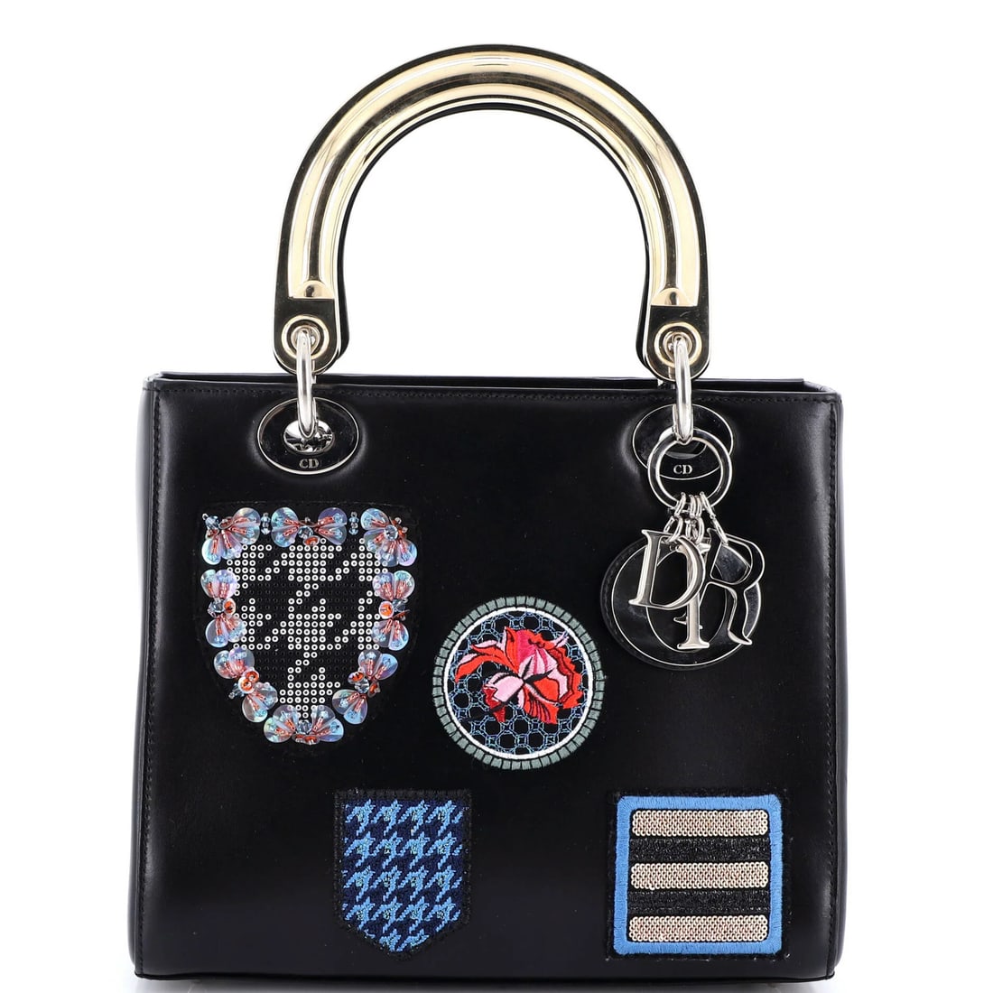 Christian Dior Lady Dior Bag Medium Leather Patch Embellished: Christian Dior Lady Dior Bag Medium Leather Patch Embellished Black Medium Leather Patch Embellished Lady Dior Bag with Silver Hardware, featuring a classic top handle design and a spacious interior.