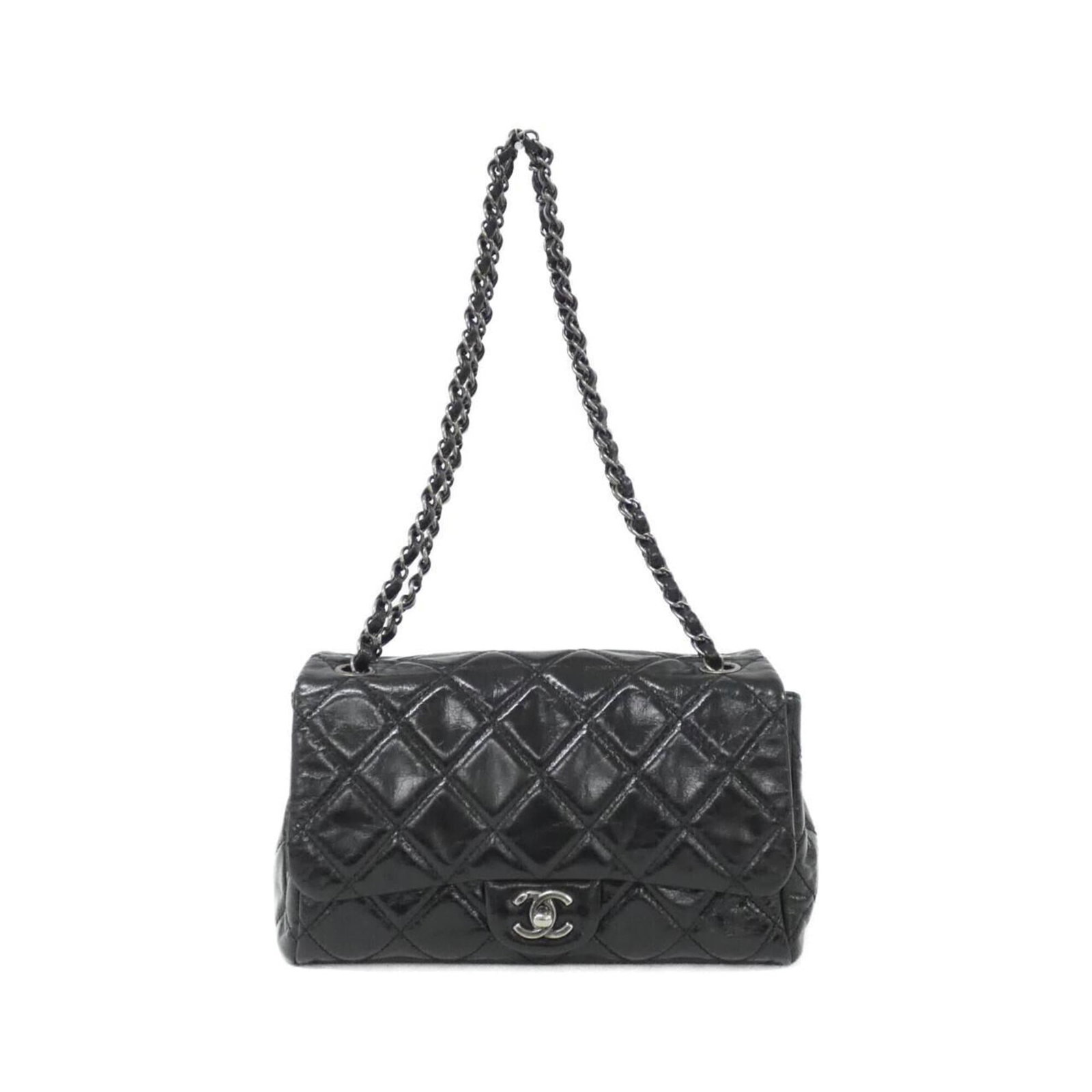 Shoulder Bag Leather Chanel: Shoulder Bag Leather Chanel Leather Chanel shoulder bag in black calfskin, measuring 15cm x 25cm x 12cm. This classic design showcases the timeless elegance of Chanel's signature style, with its