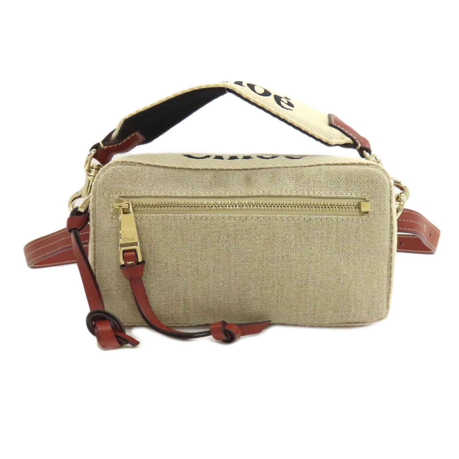 Fanny Pack Canvas: Fanny Pack Canvas Brown canvas fanny pack with a size of 11cm x 20.5cm x 6cm. Made from canvas material, this fanny pack bears a signature. It is a brown-colored, women's fanny pack. Item Specifics: B