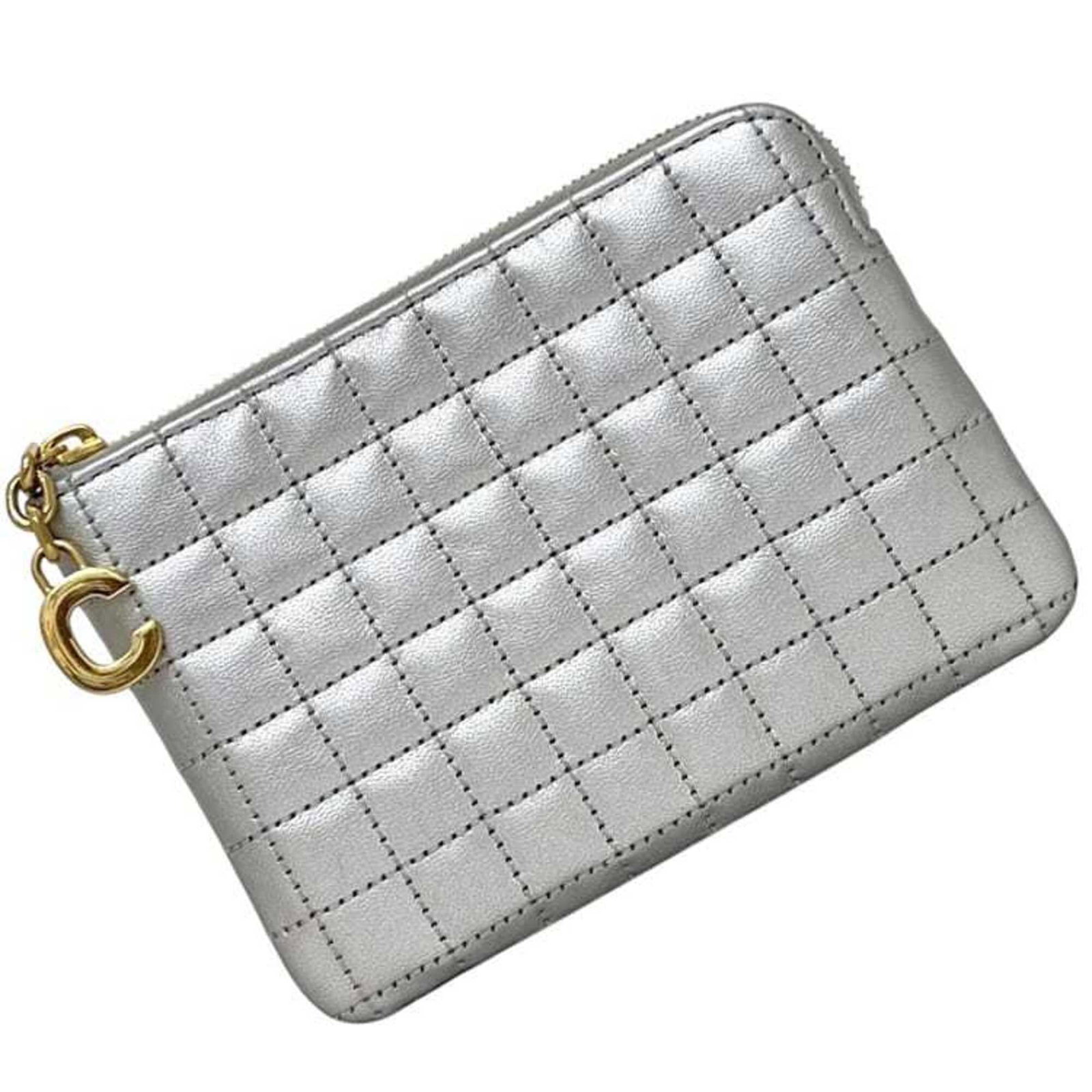 Celine Coin Purse/ Coin Case Leather: Celine Coin Purse/ Coin Case Leather The Celine Coin Purse/ Coin Case Leather is a sleek and sophisticated accessory, featuring a silver leather exterior with a compact size that makes it easy to