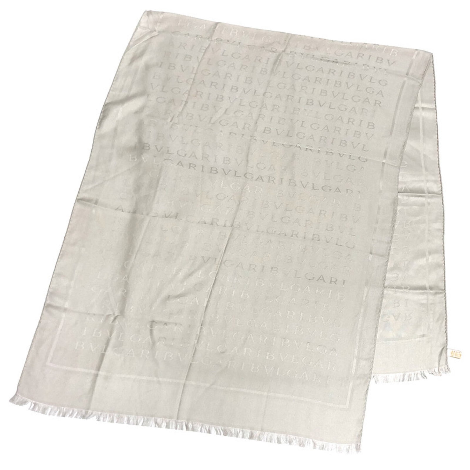 Bvlgari Shawl Silk Wool: Bvlgari Shawl Silk Wool Bvlgari's Shawl is a luxurious piece made from a blend of silk and wool, crafted in Italy. Measuring 70cm x 1.78m, it boasts a striking gray and silver color combination. This 