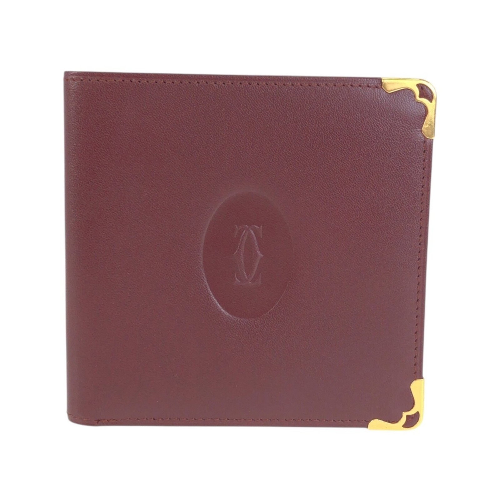 Cartier Wallet (Bi-Fold) Leather: Cartier Wallet (Bi-Fold) Leather Cartier's bi-fold leather wallet features a rich wine red color and a sleek design. Made from high-quality leather, this wallet measures 9.5cm x 10cm x 1cm, making it 