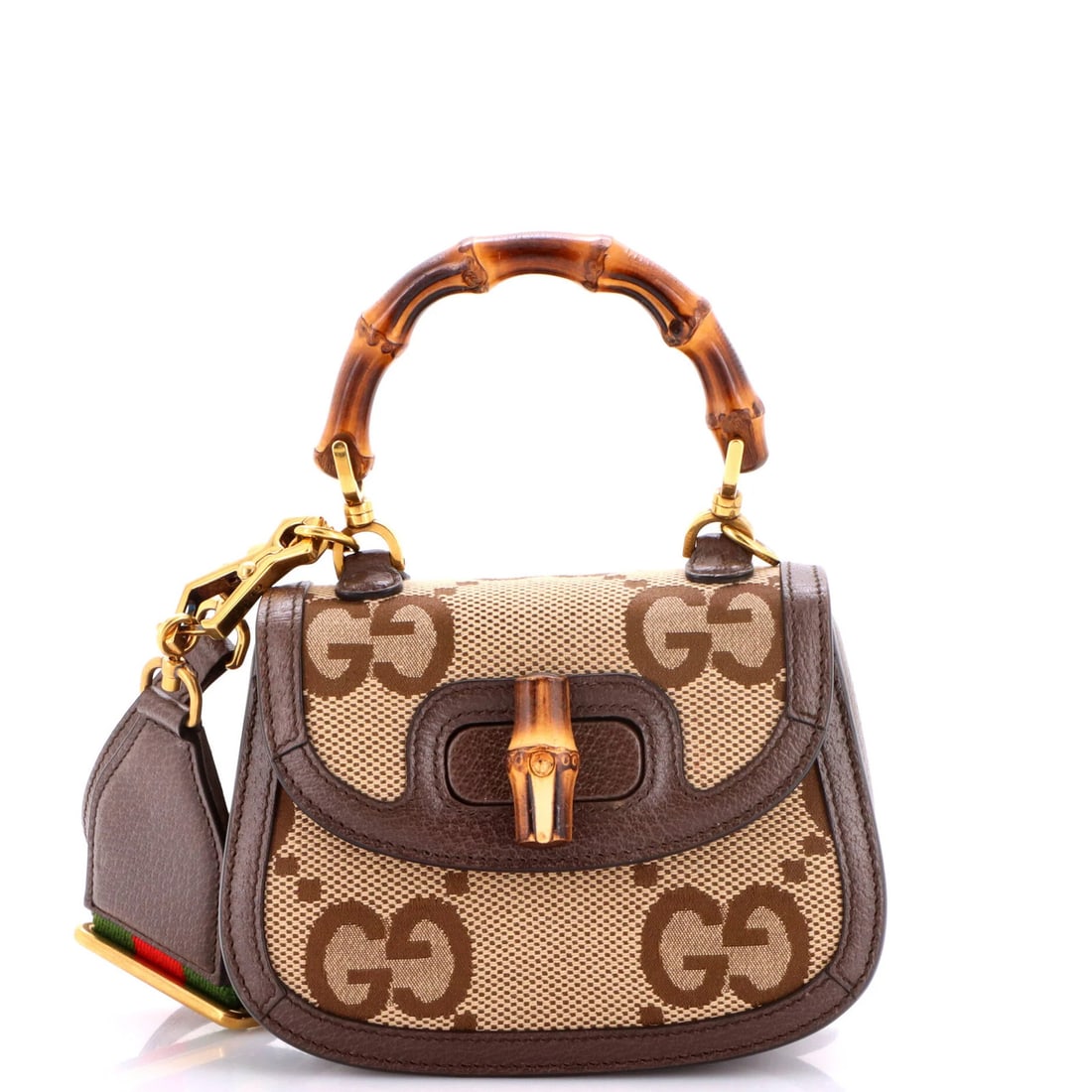Gucci Bamboo GG Canvas 1947 Mini Jumbo Top Handle Bag: Gucci Bamboo GG Canvas 1947 Mini Jumbo Top Handle Bag The Gucci Bamboo GG Canvas 1947 Mini Jumbo Top Handle Bag features a unique combination of classic design and sustainable bamboo materials,