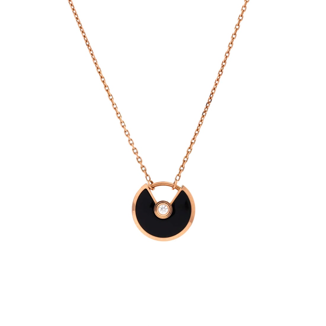 Cartier Pendant Necklace with Onyx Diamond 18K Rose Gold: Cartier Pendant Necklace with Onyx Diamond 18K Rose Gold The Cartier Amulette de Cartier Pendant Necklace with Onyx and Diamond features a striking 18K rose gold setting, adorned with a high-quality