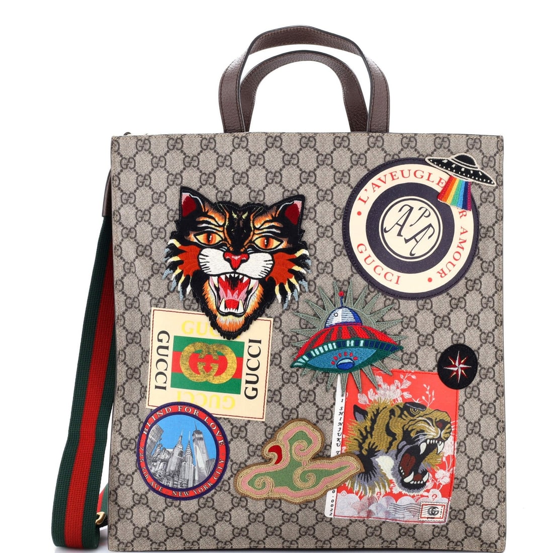 Soft Gucci Coated GG North Canvas Convertible Open Tote Applique With: Soft Gucci Coated GG North Canvas Convertible Open Tote Applique With Soft and stylish, this Gucci Coated GG North Canvas Convertible Open Tote features a unique applique design and a spacious interio