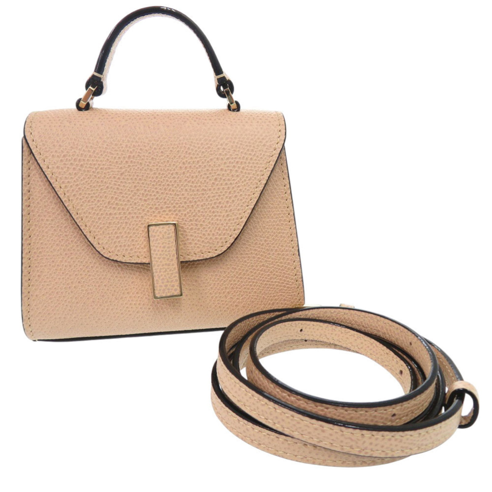 Handbag Leather Valextra: Handbag Leather Valextra The Valextra Handbag is a high-quality leather bag from Italy, featuring a classic design with a beige color and durable construction. Measuring 9.5cm x 12cm x 6.5cm, it