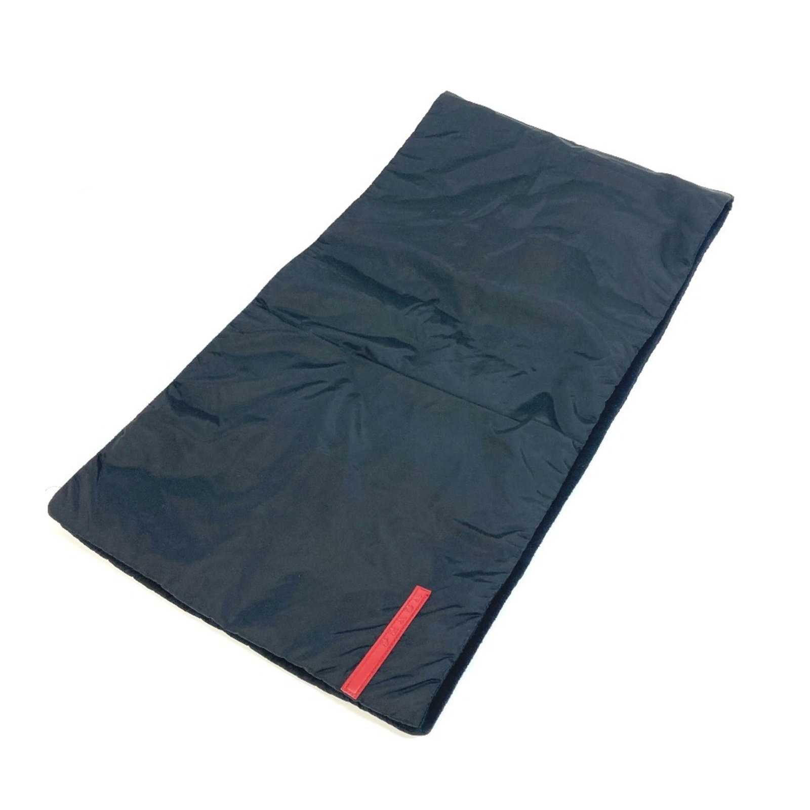 Stole Nylon Prada: Stole Nylon Prada Stole Nylon Prada is made from high-quality nylon material, measuring 1.08m x 27.5cm in size. The black color provides a sleek and modern appearance, while the stole's design allows