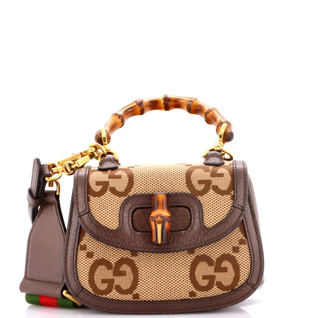 Gucci Bamboo GG Canvas 1947 Mini Jumbo Top Handle Bag: Gucci Bamboo GG Canvas 1947 Mini Jumbo Top Handle Bag The Gucci Bamboo GG Canvas 1947 Mini Jumbo Top Handle Bag is a stylish and compact cross-body bag featuring a classic design. Made from
