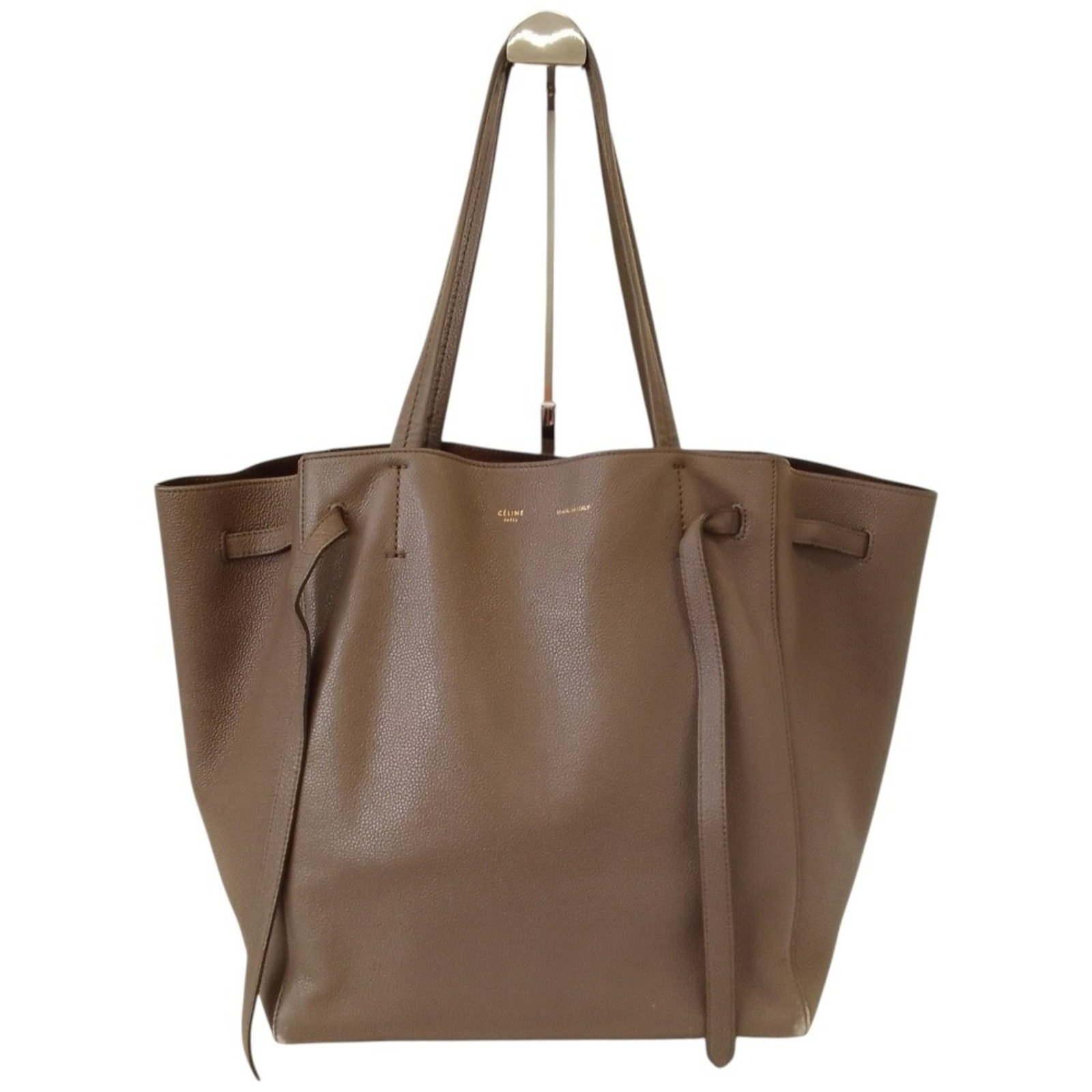 Celine Bag Tote: Celine Bag Tote Grayish Celine Tote Bag for Women. This 32cm x 50cm x 17cm tote bag features a signature and is made of a durable design with a 51cm handle length. The Celine brand is known for its