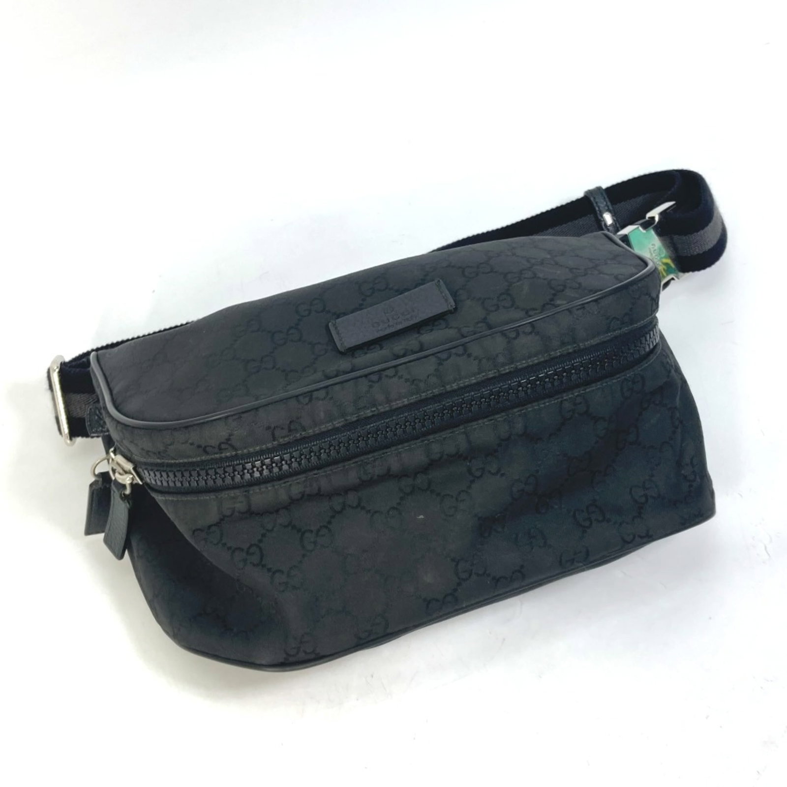 Cloth Other Gucci: Cloth Other Gucci The Gucci cloth item is a black, men's accessory with a size of 25.5cmx10.5cmxD9.5cm and 10.0x4.1xD3.7inch. It bears a signature and is made of cloth material. This item is a Gucci