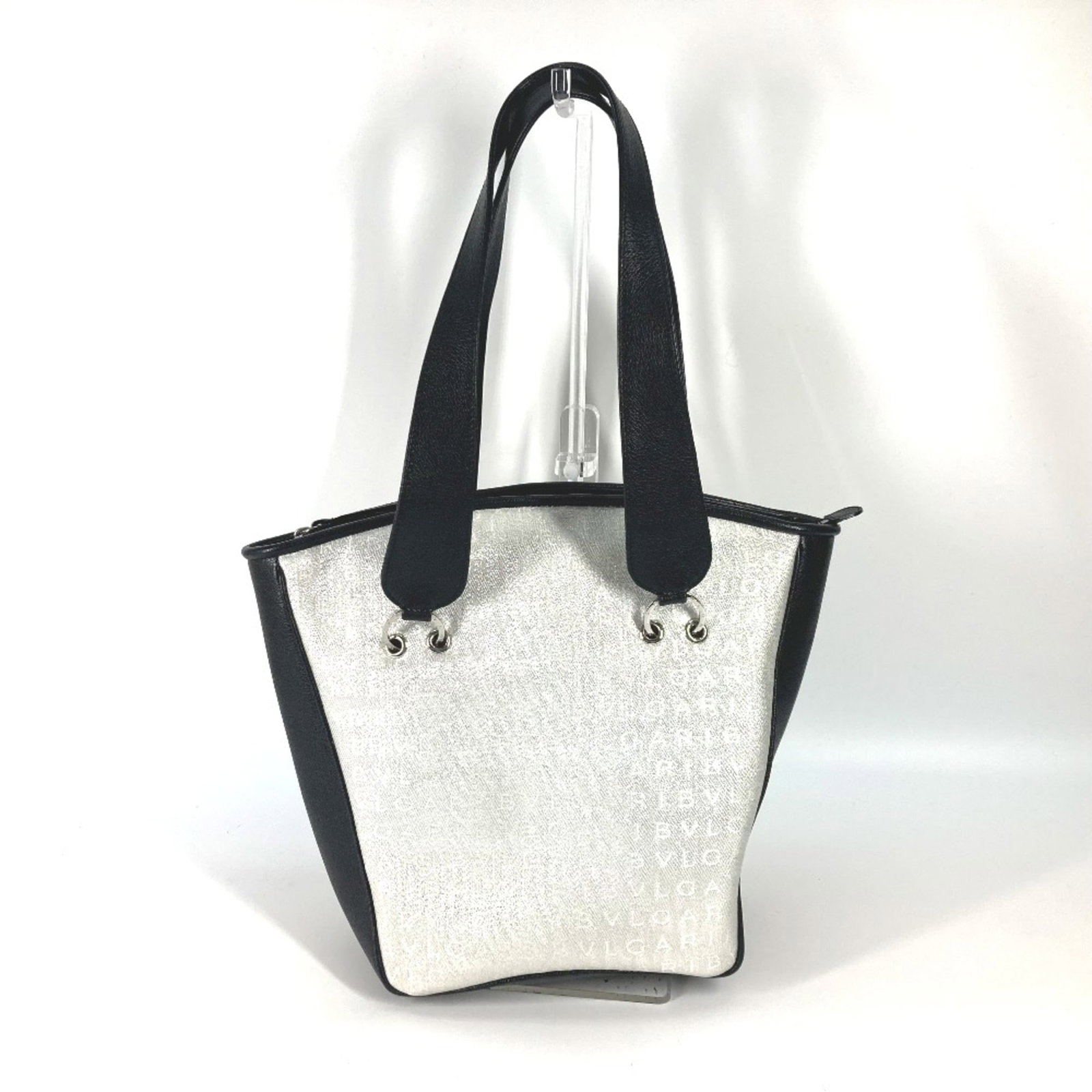 Handbag Other By Bvlgari: Handbag Other By Bvlgari White Bvlgari Handbag, 28cm x21cm x15cm. This handbag features a classic design with a white color. The bag's dimensions are 28cm x 21cm x 15cm, making it a stylish and