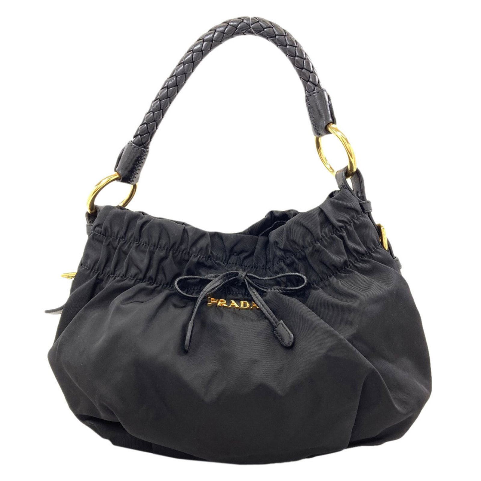 Nylon Prada Handbag: Nylon Prada Handbag Black Nylon Prada Handbag, 23cm x 27cm x 10cm, bears a signature. Made from high-quality nylon, this stylish handbag features a sleek design. Its compact size makes it a practical