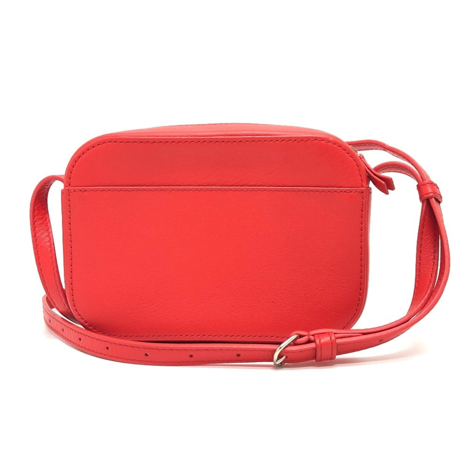 Shoulder Bag Leather Balenciaga Pochette: Shoulder Bag Leather Balenciaga Pochette Red leather Balenciaga pochette with silver hardware, measuring 12cm x 17.5cm x 5cm. This shoulder bag features a striking red color and sleek design. Made