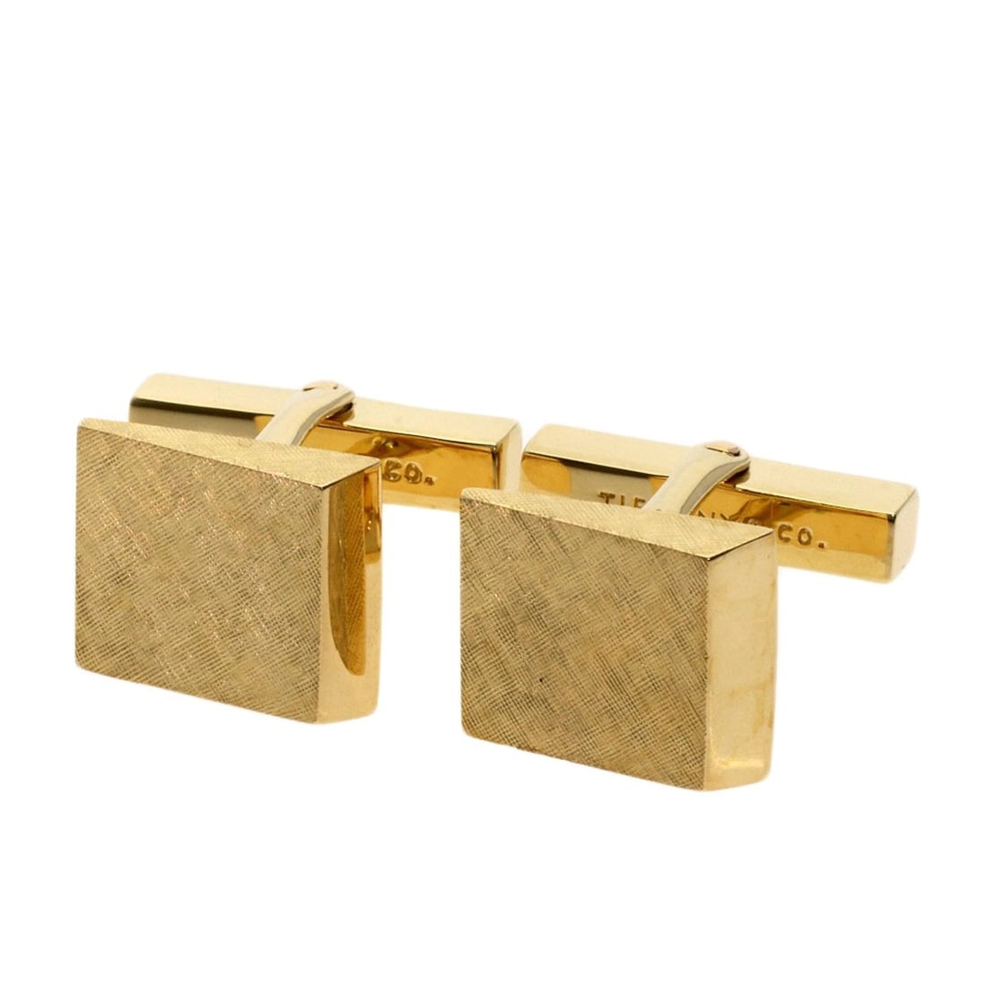 Yellow Gold Square Motif Cuffs K14 Tiffany: Yellow Gold Square Motif Cuffs K14 Tiffany K14 Yellow Gold Square Motif Cuffs from Tiffany&Co. showcase a classic design with a timeless gold metal color. The square motif pattern adds a touch of eleg