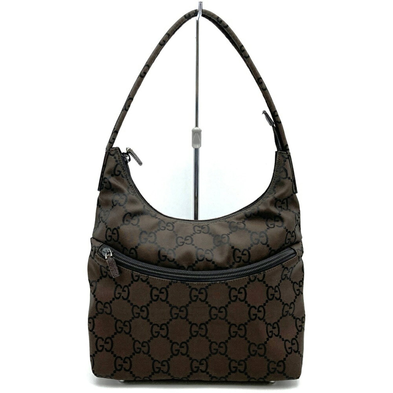 Nylon handbag shoulder bag: Nylon handbag shoulder bag Brown Nylon Shoulder Bag from Gucci, 25cm x 31cm x 12cm, perfect for everyday use. This stylish shoulder bag features a durable nylon material and a classic design that's
