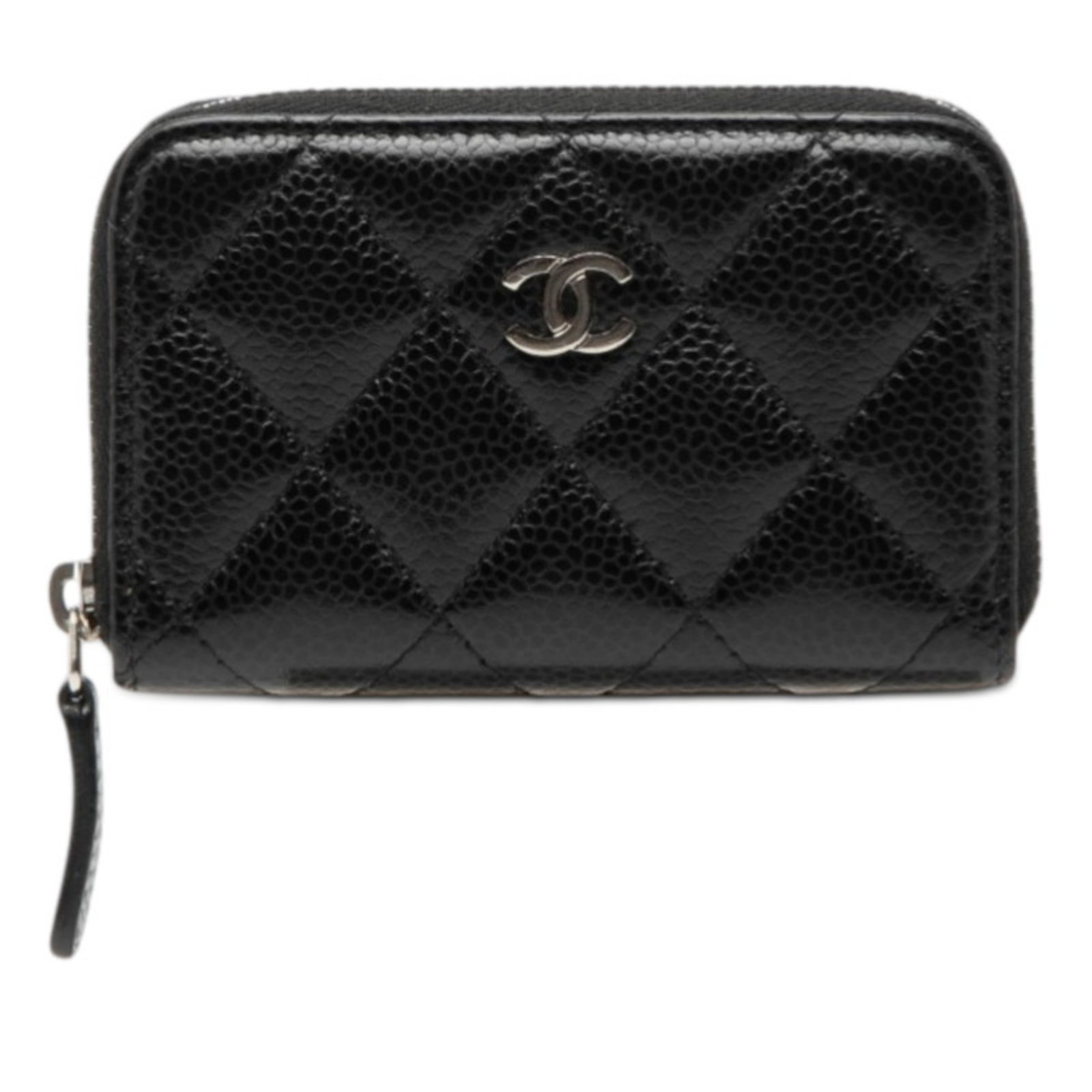 Coin Case Grained Calfskin by Chanel: Coin Case Grained Calfskin by Chanel Grained Calfskin Coin Case by Chanel features a sleek black design with a zipper closure, perfect for storing coins or small treasures. Made from high-quality