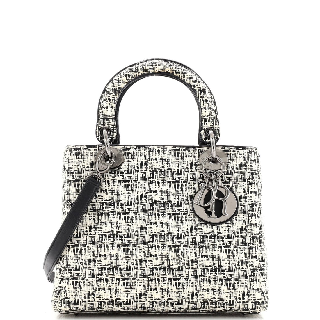 Lady Dior Tweed Medium Christian Dior Bag: Lady Dior Tweed Medium Christian Dior Bag Tweed fabric gives the Lady Dior Bag a classic, sophisticated look. With its medium size and top handle, this bag is easy to carry and versatile for everyday 