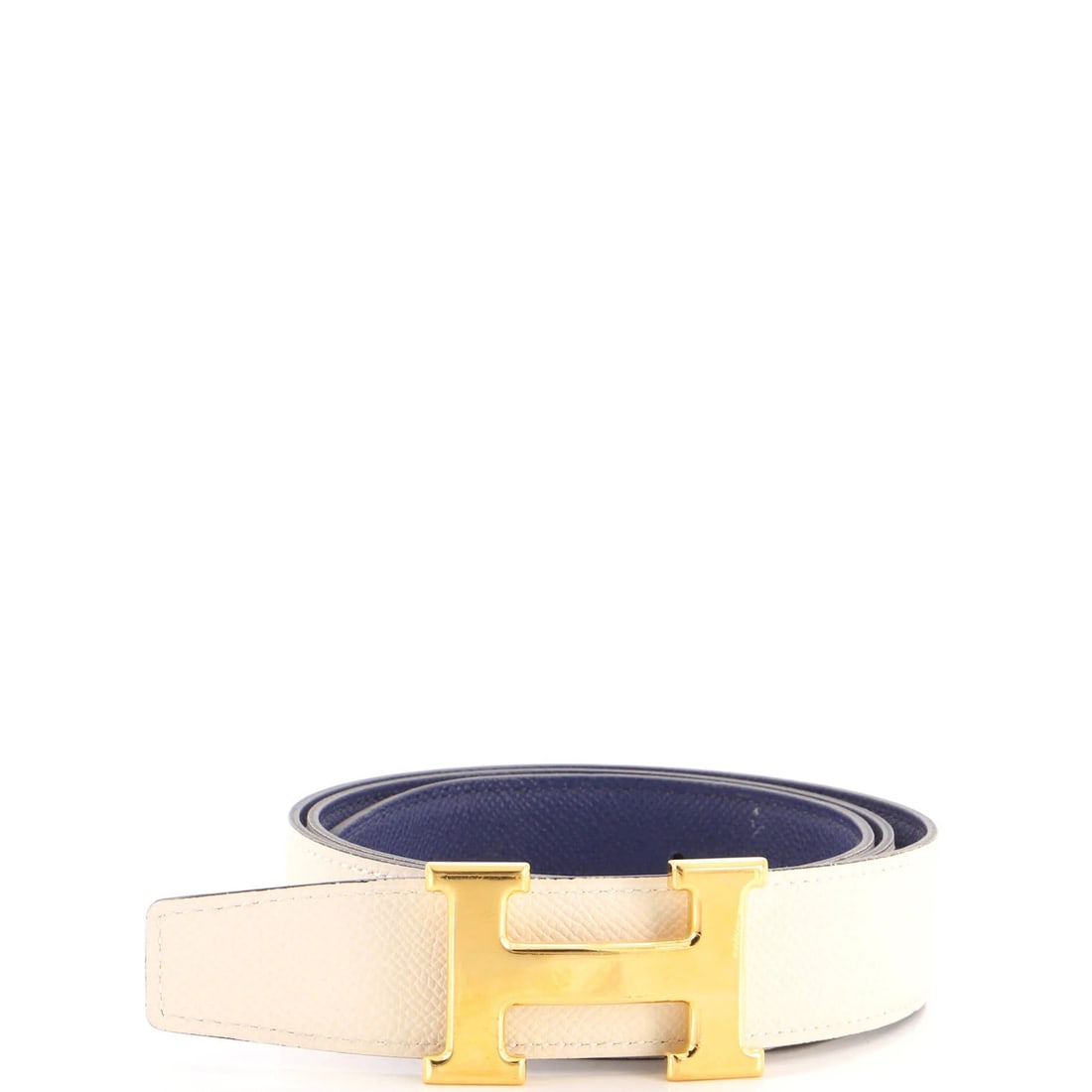 Hermes Leather Medium Belt Reversible: Hermes Leather Medium Belt Reversible The Hermes Leather Medium Belt Reversible boasts a neutral exterior with a blue interior, adding a pop of color to any outfit. Its medium size and 40" length