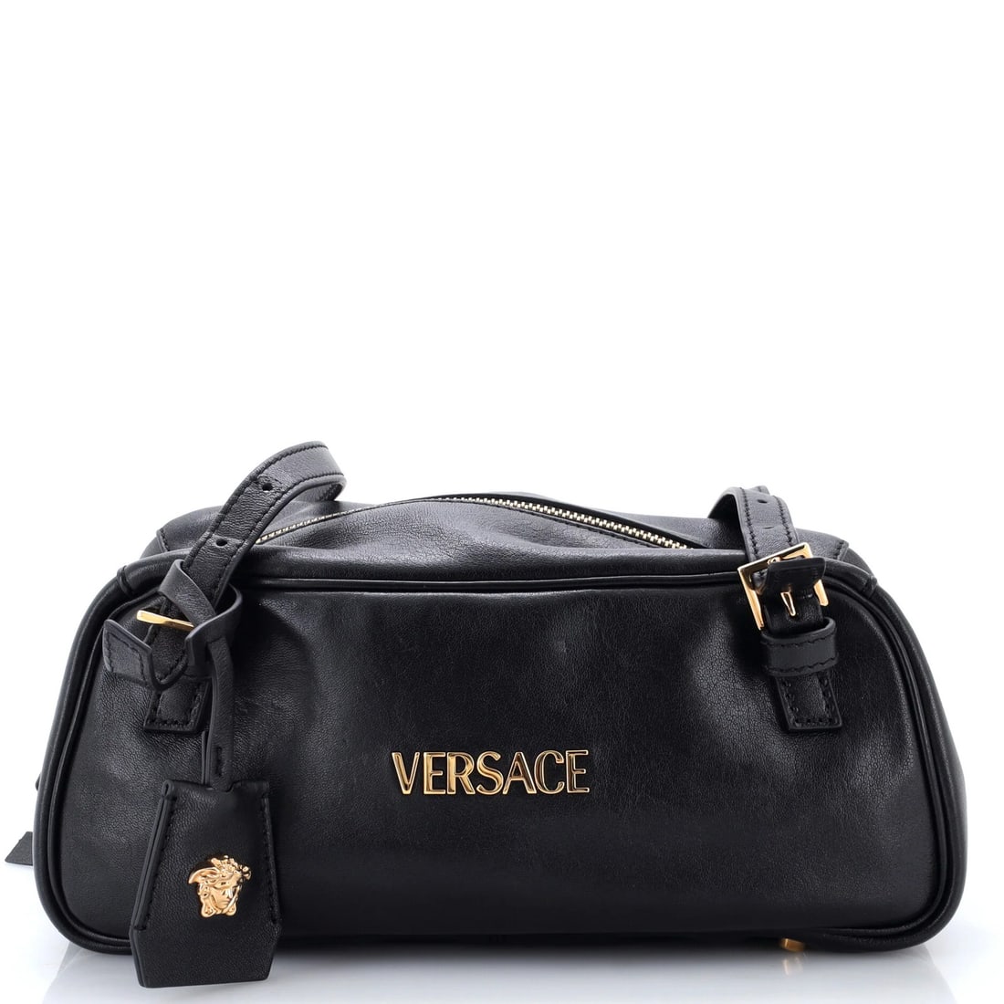 Large Leather Bag Bowling Tag Versace: Large Leather Bag Bowling Tag Versace Large Leather Bag with Versace Bowling Tag in Black. This large leather bag features a striking bowler design with a black exterior and gold hardware. The bag's