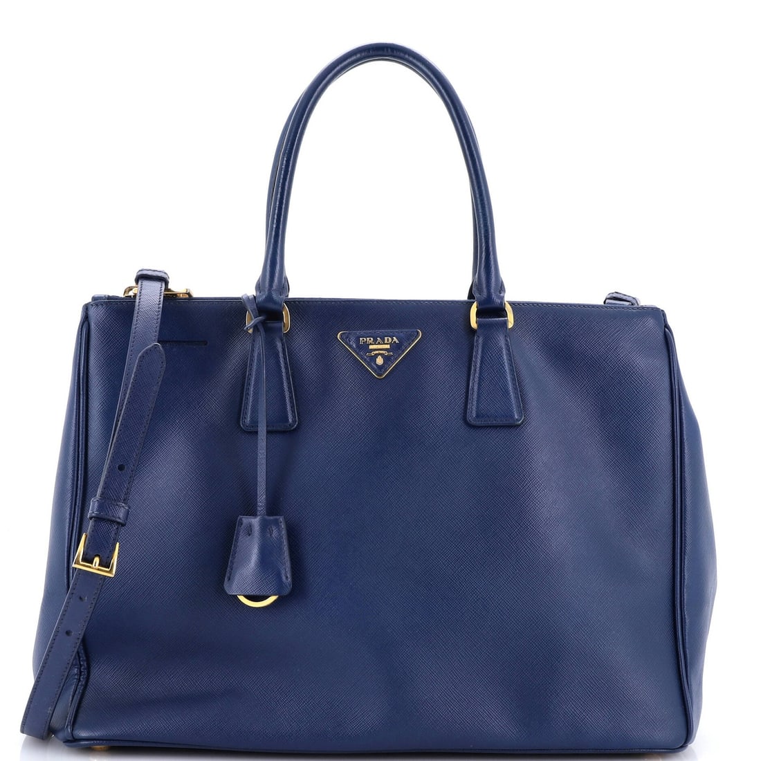 Saffiano Leather Double Tote Lux Prada Large: Saffiano Leather Double Tote Lux Prada Large Saffiano Leather Double Zip Lux Tote in Blue measures 10.5" high, 14" wide, and 6" deep, with a 4.5" drop handle. The exterior features heavy corner wear,