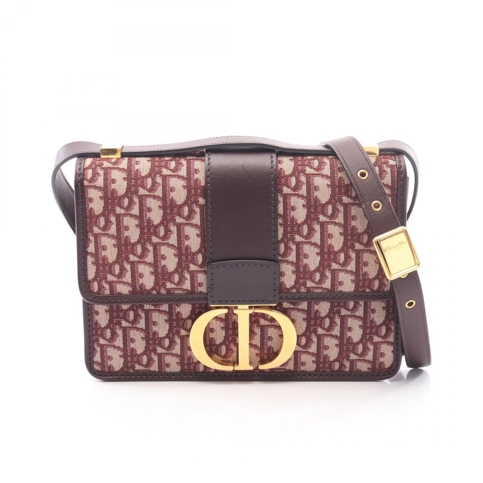 Canvas Leather Handbag Shoulder Christian Dior: Canvas Leather Handbag Shoulder Christian Dior Canvas Leather Handbag Shoulder from Christian Dior features a Bordeaux color and a mix of canvas and leather materials. The bag measures 18cm x 24cm x