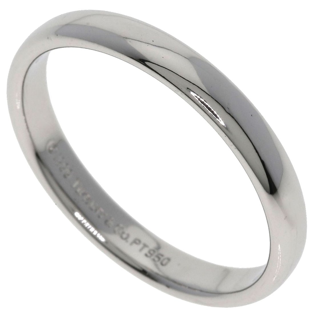Tiffany Co Platinum Wedding Ring: Tiffany Co Platinum Wedding Ring Platinum Wedding Ring from Tiffany & Co. in a sleek silver finish, crafted from 950 platinum. This stylish ring features a classic design with no main stone, making