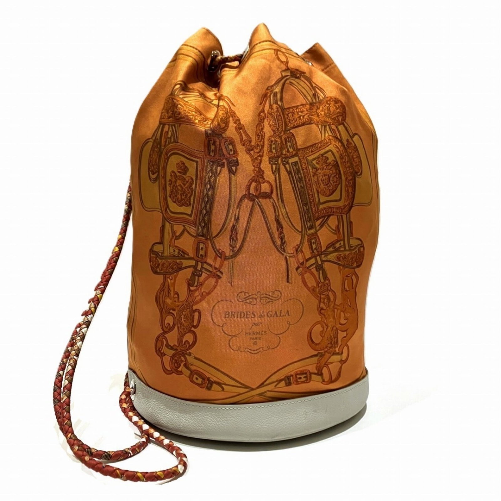 Hermes Silk Leather Shoulder Bag: Hermes Silk Leather Shoulder Bag Silk and leather come together in this vibrant orange Hermes shoulder bag, measuring 33cm x 22cm x 22cm. The bag's strap length is 76cm, providing a comfortable fit.