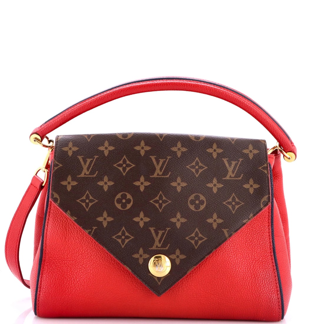 Double V Handbag Calfskin Louis Vuitton Monogram: Double V Handbag Calfskin Louis Vuitton Monogram Double V Handbag Calfskin Louis Vuitton Monogram features a striking red canvas exterior with a rich, structured design. The bag's classic style is com