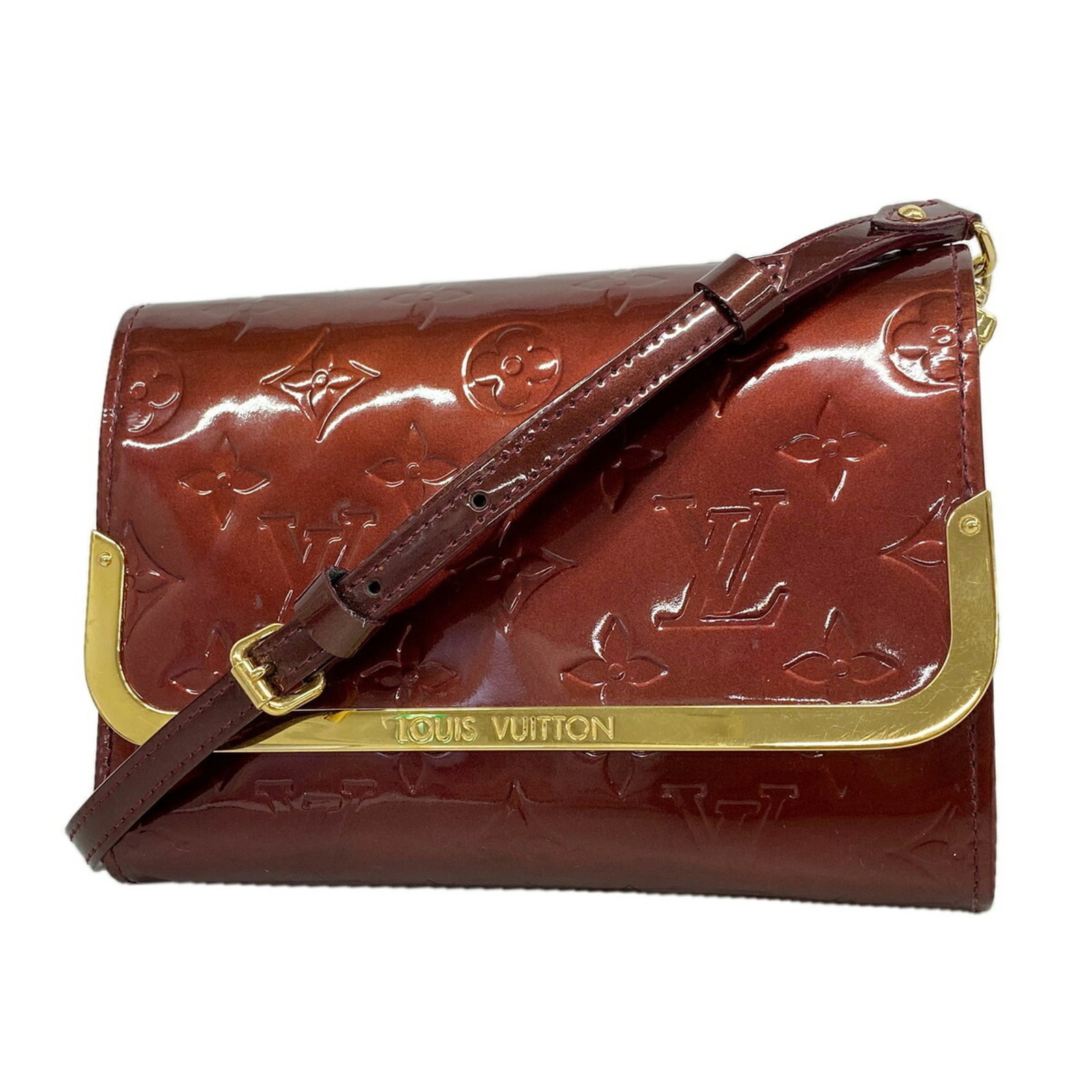 Shoulder Bag by Louis Vuitton: Shoulder Bag by Louis Vuitton Rouge fauviste, a vibrant and bold hue, adds a pop of color to this sleek Louis Vuitton shoulder bag. Measuring 13.5cm x 17.5cm x 3cm, the bag's compact size makes it