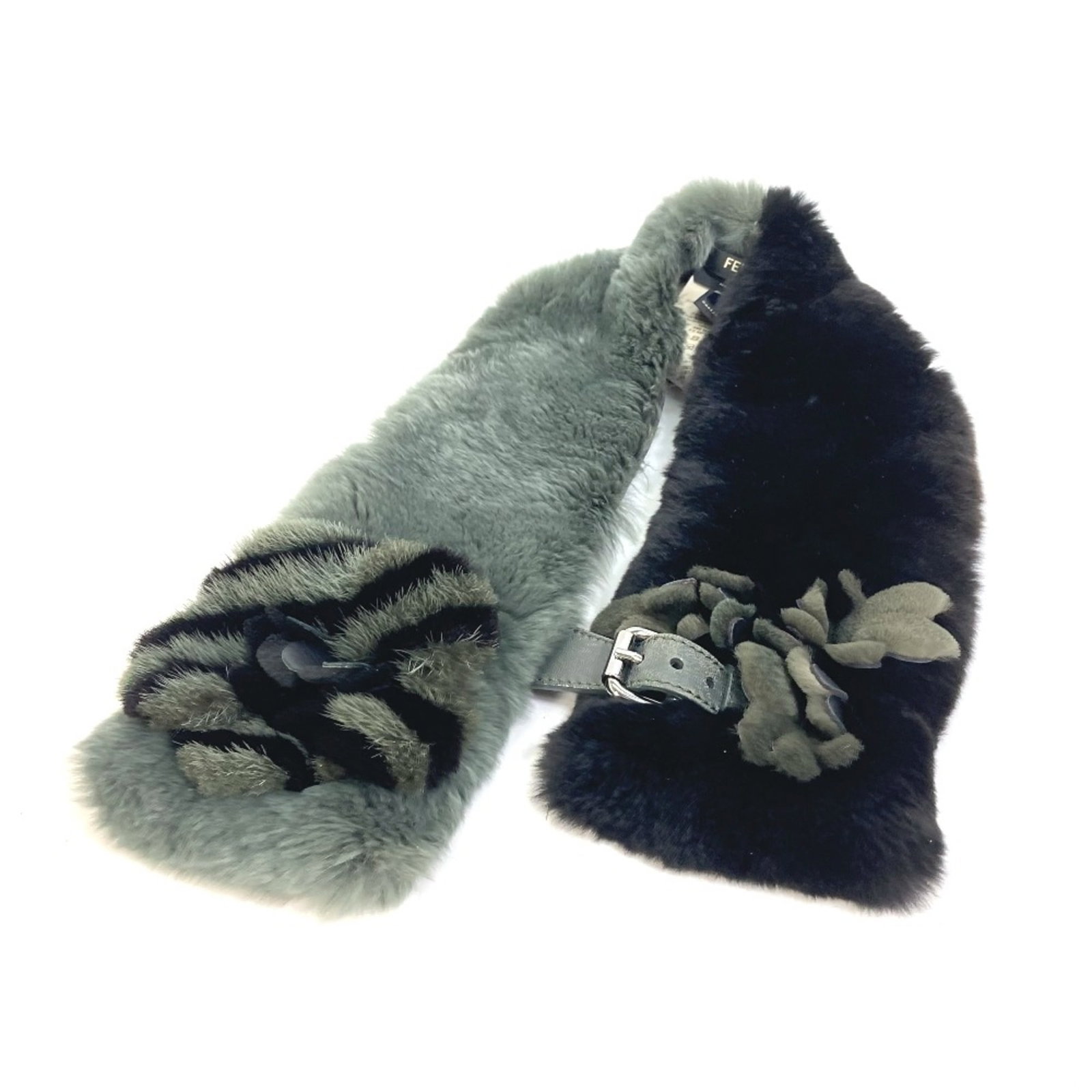 Fendi Stole Other: Fendi Stole Other Fendi Stole Other is a unique green stole with a distinctive size, measuring 3.5 x 27.6 inches in width and 9cm x 70cm in length. Its striking design makes it a notable feature of