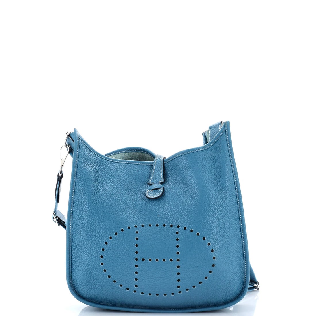 Evelyne Bag Gen III Clemence Hermes PM: Evelyne Bag Gen III Clemence Hermes PM The Evelyne Bag Gen III Clemence PM from Hermes is a stylish cross body bag with a blue exterior and interior, featuring palladium hardware. Measuring 10.5"