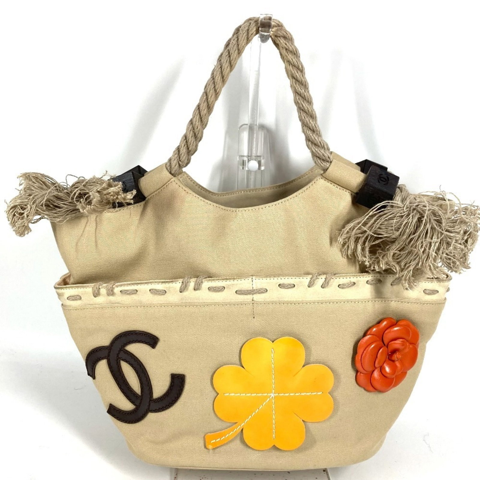 Canvas Shoulder Bag Chanel Handbag: Canvas Shoulder Bag Chanel Handbag Canvas Shoulder Bag in Beige from Chanel. This 23cm x 24cm x 13.5cm shoulder bag features a canvas material and a classic design. The beige color adds a touch of