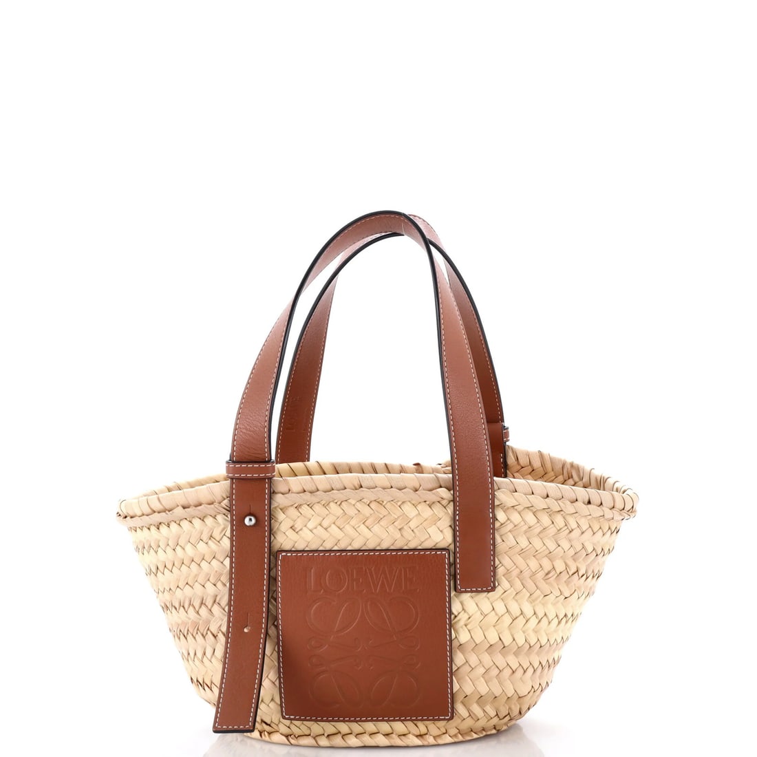 Loewe Raffia Small Basket Tote: Loewe Raffia Small Basket Tote Small, elegant, and effortlessly chic, this Loewe Raffia Small Basket Tote boasts a timeless design with a rich, brown leather exterior and a natural raffia interior.