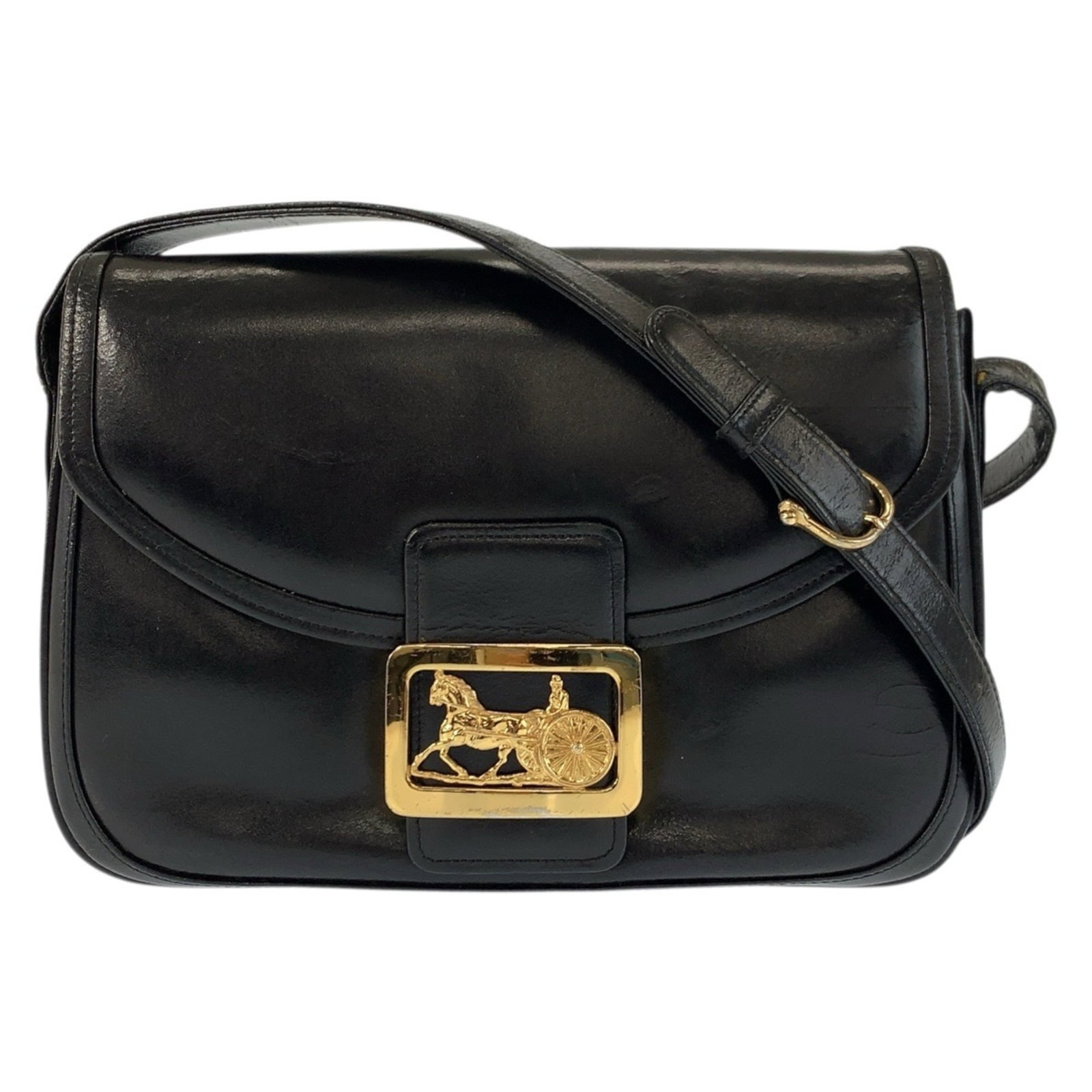 Shoulder Bag Leather Celine: Shoulder Bag Leather Celine Black leather Celine shoulder bag with gold hardware, featuring a flap closure and adjustable strap length. Measuring 18cm x 26cm x 6cm, this bag is a stylish and