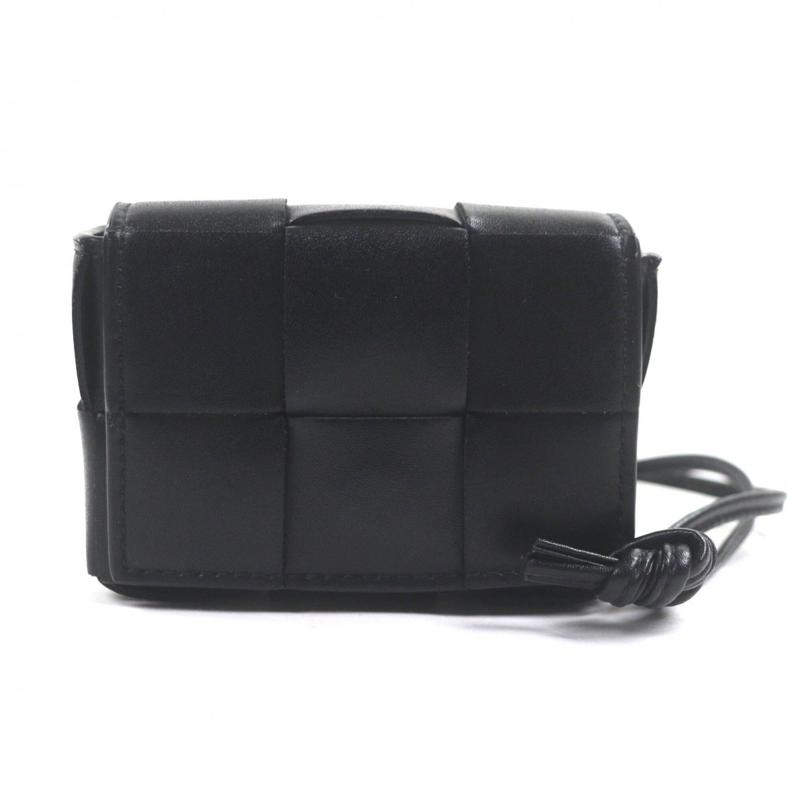 Bottega Veneta Shoulder Bag Leather: Bottega Veneta Shoulder Bag Leather Bottega Veneta's signature leather craftsmanship is evident in this sleek shoulder bag, made from high-quality black leather. The bag's compact size and classic