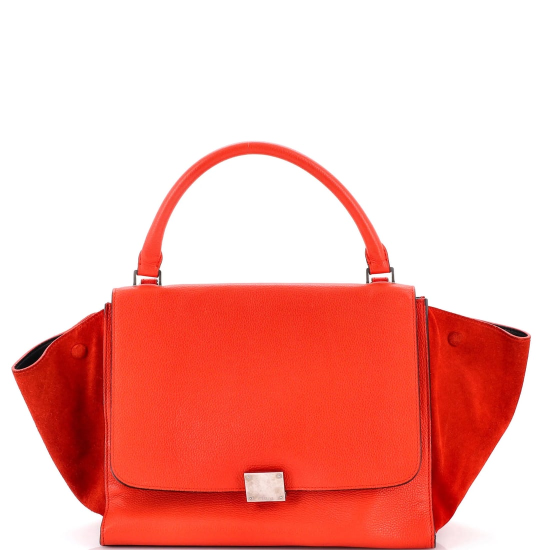 Medium leather Trapeze bag Celine: Medium leather Trapeze bag Celine The Celine Medium Leather Trapeze Bag boasts a striking red exterior with heavy edge wear, scuffs, and creases, giving it a unique, worn-in look. With its silver