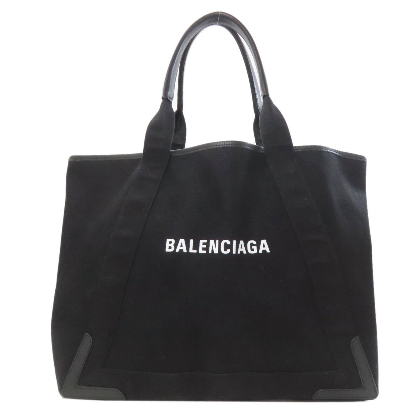 Balenciaga Pouch Tote Bag Canvas: Balenciaga Pouch Tote Bag Canvas Canvas tote bag from Balenciaga, featuring a sleek black design with a signature. The bag measures 34cm x 41cm x 20cm, making it a compact and stylish accessory. Its