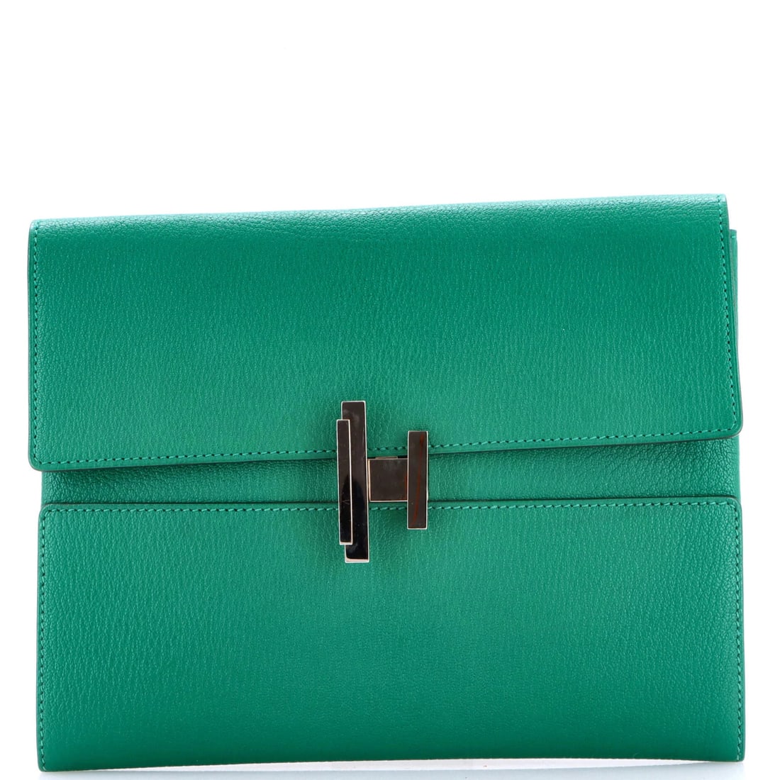 Hermes Cinhetic Clutch Chevre Mysore: Hermes Cinhetic Clutch Chevre Mysore The Hermes Cinhetic Clutch Chevre Mysore is a unique green leather clutch with a rich history. Measuring 7.5" in height, 9.5" in width, and 1" in depth, this styli