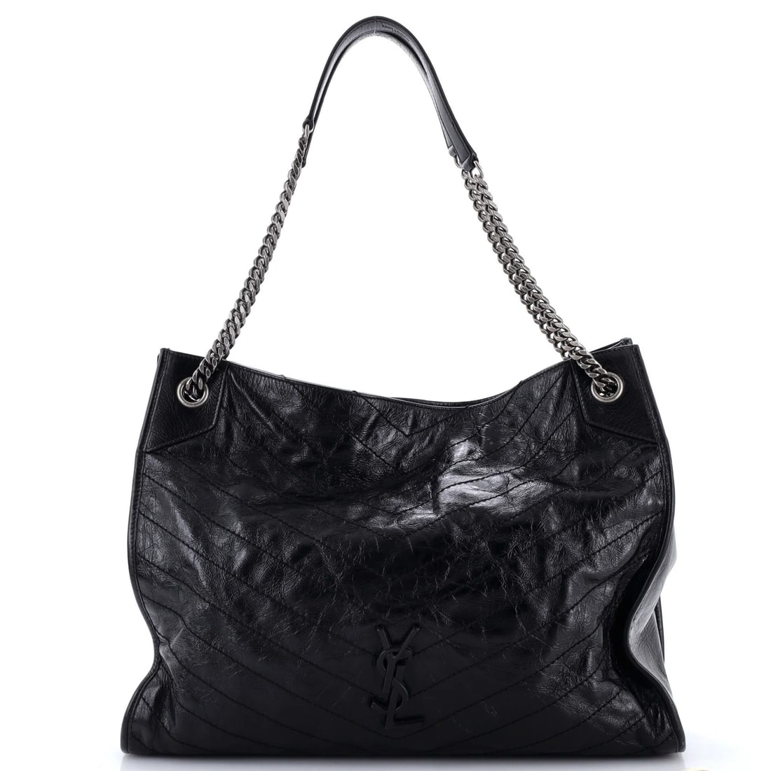 Saint Laurent Niki Shopping Matelasse Leather Tote Chevron Large: Saint Laurent Niki Shopping Matelasse Leather Tote Chevron Large Large Saint Laurent Niki Shopping Matelasse Leather Tote Chevron in Black features a spacious interior and sturdy leather exterior with